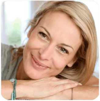Smiling customer sharing positive testimonial experience with PrimeBiome and overall wellness improvement